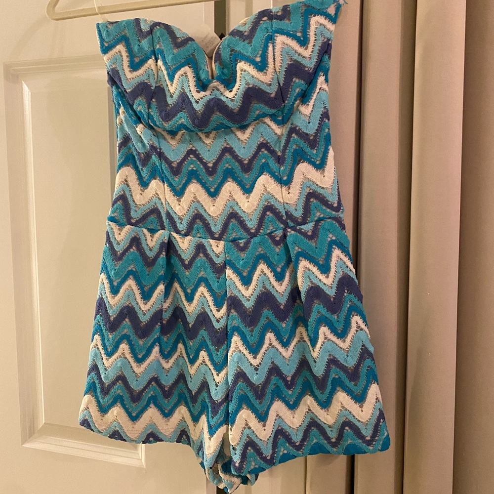 Blue romper with detachable white belt